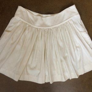 Cream Express skirt with pockets, size 10